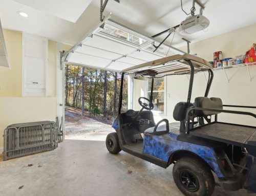 Damaged Garage Door Panel Replacement: Should You Replace Just One Panel or the Entire Door?