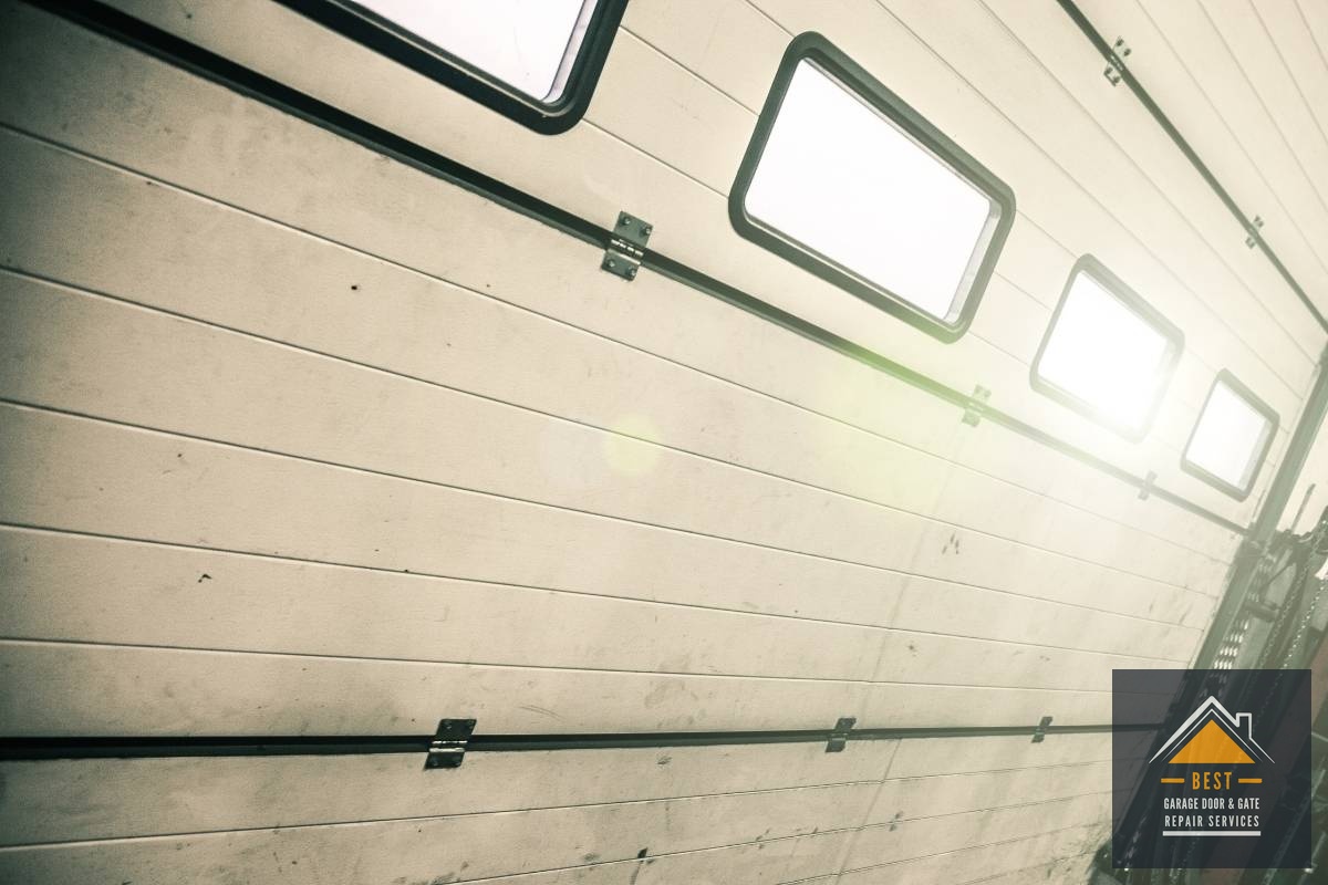 The Repair vs. Replacement Cost Difference - Bent Garage Door Tracks: Can They Be Straightened or Do You Need Replacement?